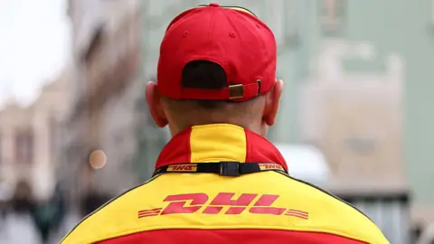 DHL Halts US Deliveries over Increased Tariffs Impact